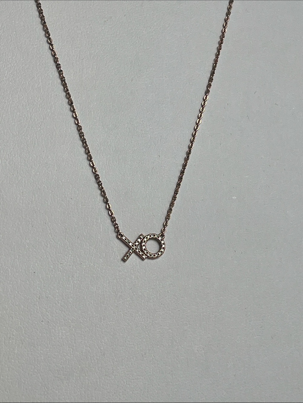 Sparkling XO Pendant Necklace in Rose Gold Tone